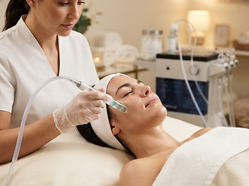 Editorial depiction of a client receiving a hydradermabrasion facial
