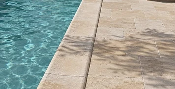 Stone pool surround