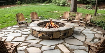 Stone fire pit and flagstone patio