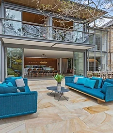 Luxury natural stone patio in a residential outdoor entertaining area