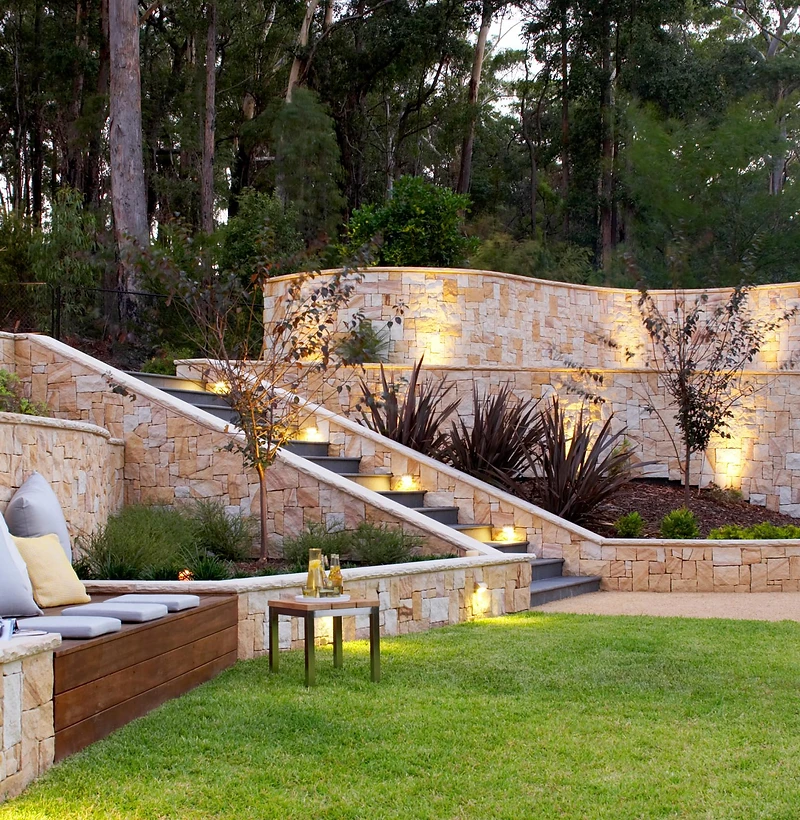 Illuminated natural stone garden walls and terraces — inspiration photography