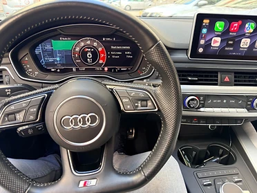 CarPlay app grid on the centre display.