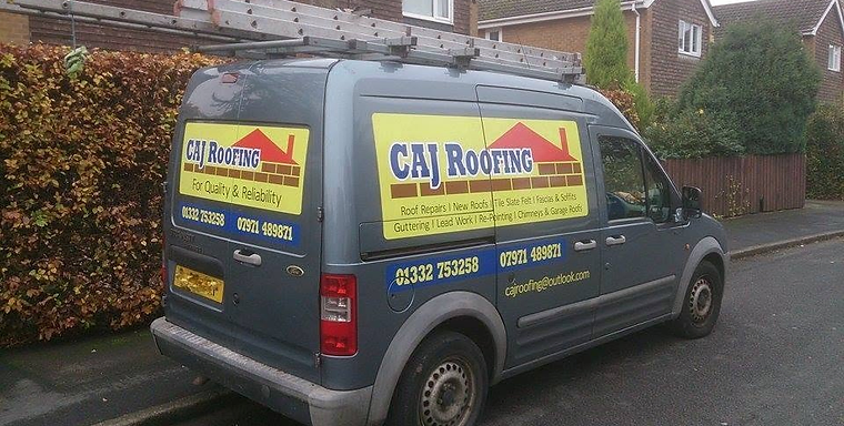 CAJ Roofing van with signage