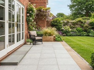 Paved patio area with a clean lawn edge