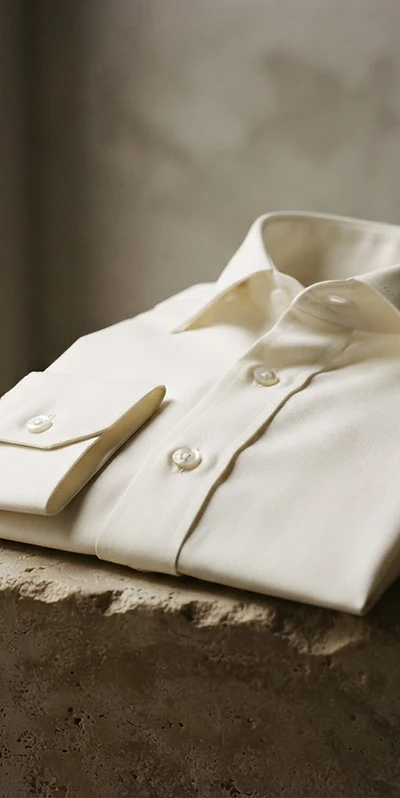 The architectural lines of an Egyptian cotton collar, finished by hand