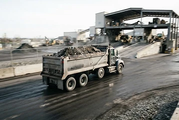 Loaded truck bed heading to a transfer station