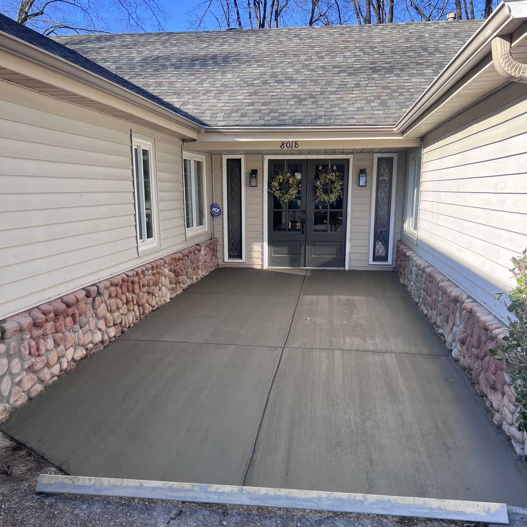 Finished concrete front porch and driveway