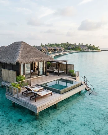 Overwater villa on a turquoise Caribbean lagoon