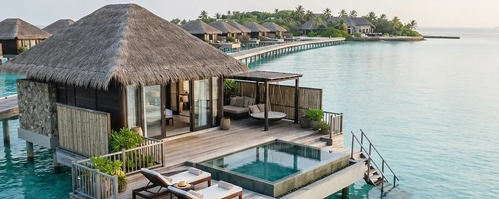 Overwater villa above a turquoise Caribbean lagoon