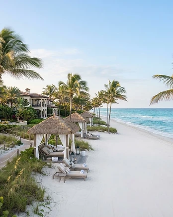 Oceanfront Florida resort with palm trees and cabanas