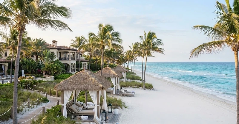 Oceanfront Florida resort with palms and cabanas