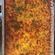 Baked mac and cheese in a catering tray