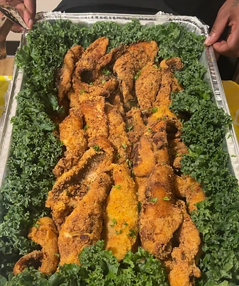 Elegant soul food catering buffet at an evening wedding