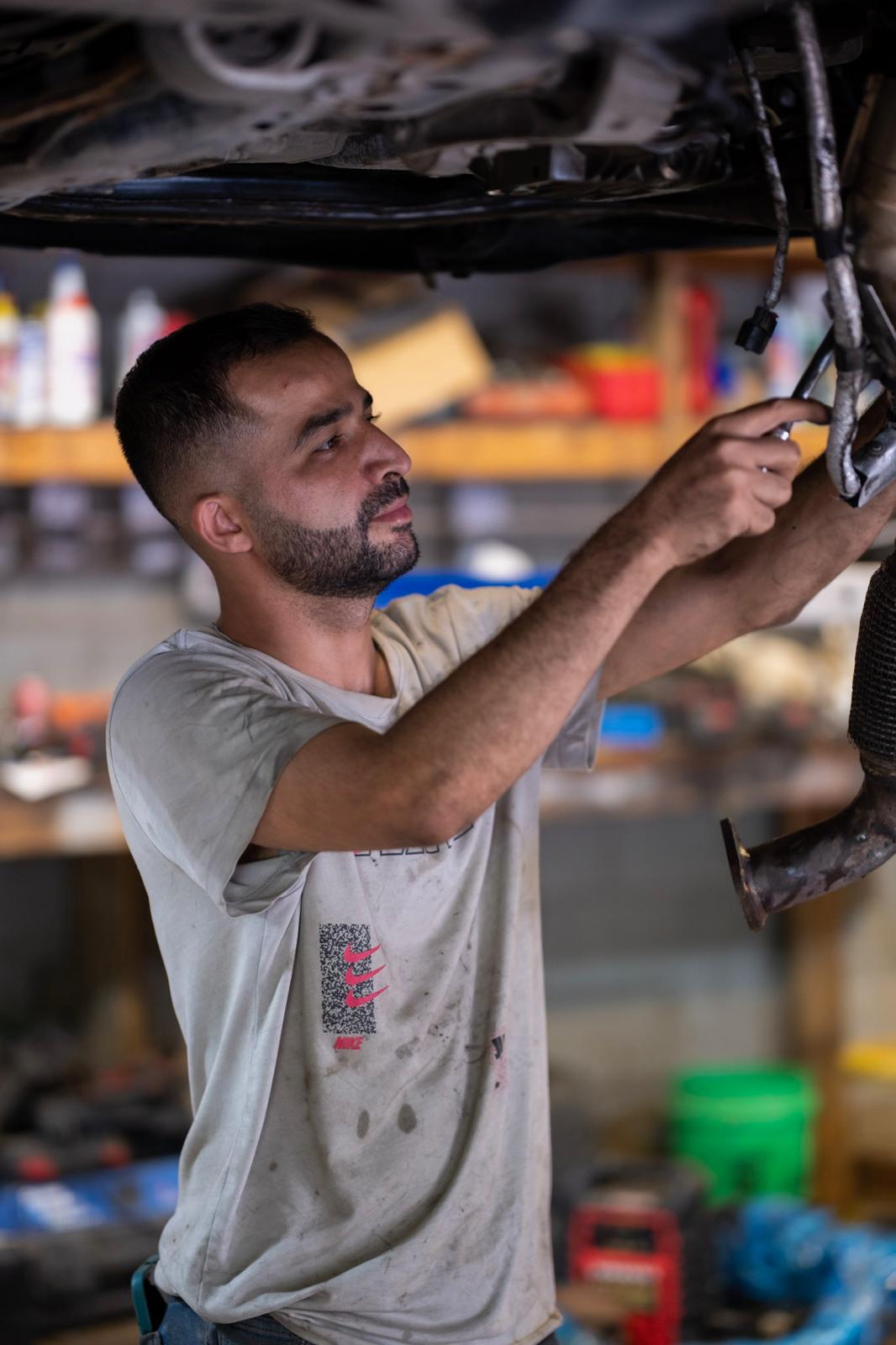 Mechanic working on a vehicle