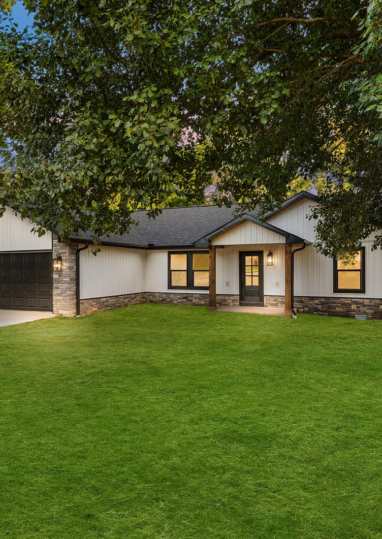Front of a completed Wright Homes build at dusk
