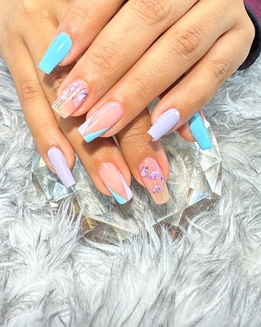Coffin nails in sky blue and periwinkle with lavender flower and butterfly decals