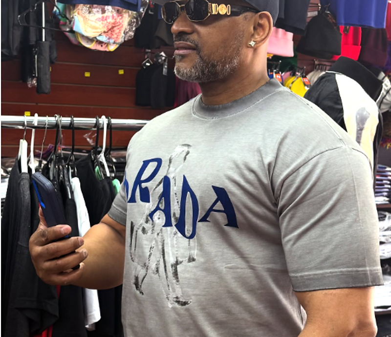 Customer wearing a cap and sunglasses in the store