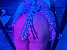 Flogger resting on the bench in blue light