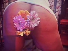 Gerbera daisies in the red-lit dungeon
