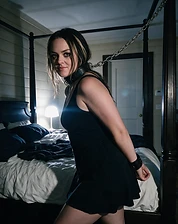 Chain collar in a dim bedroom