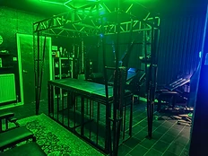 Cage table under green studio light