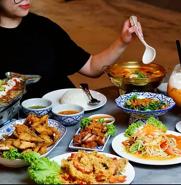 A table filled with Thai dishes at Asia Thai Restaurant