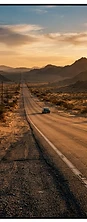 Desert highway at golden hour, cinematic film still