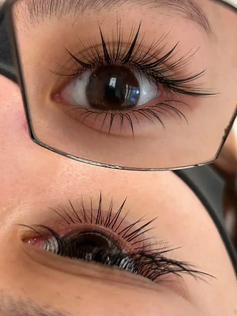Lashes beauty work by SW Beauty — Lash extensions, close up.
