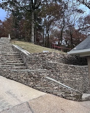 Covered Patio & Stone Wall