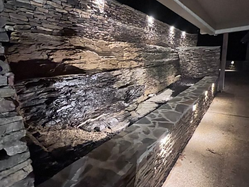 Stacked Stone Wall with Accent Lighting