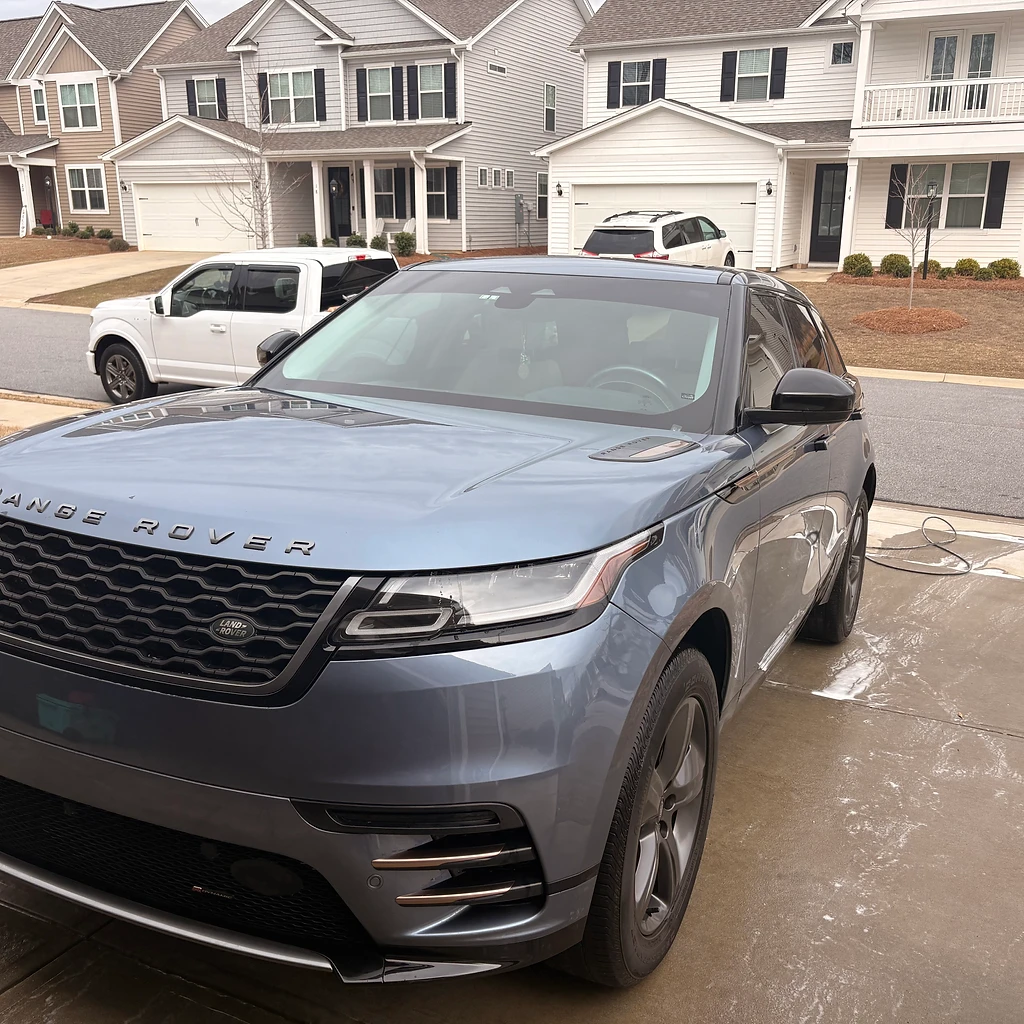 Light grey Range Rover SUV being washed during a mobile detailing appointment