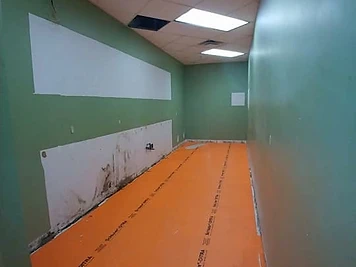 Uncoupling membrane installed over a prepared subfloor before tile flooring
