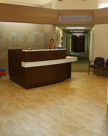 Reception and hallway in a completed commercial office renovation by Home Res-Q