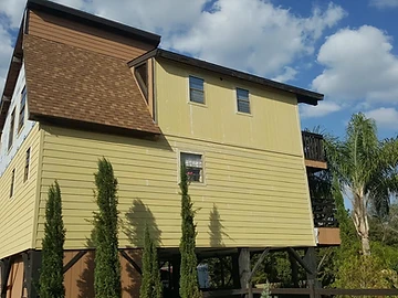 Completed siding replacement on a Florida home exterior by Home Res-Q
