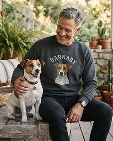 Pet owner wearing personalised pet portrait apparel with their pet