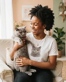 Pet owner wearing personalised pet portrait apparel with their pet