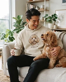 Pet owner wearing personalised pet portrait apparel with their pet