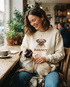 Pet owner wearing personalised pet portrait apparel with their pet