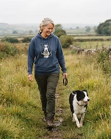 Pet owner wearing personalised pet portrait apparel with their pet