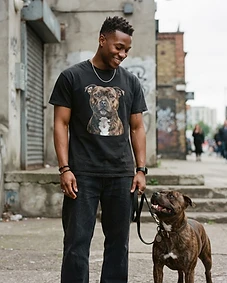 Pet owner wearing personalised pet portrait apparel with their pet