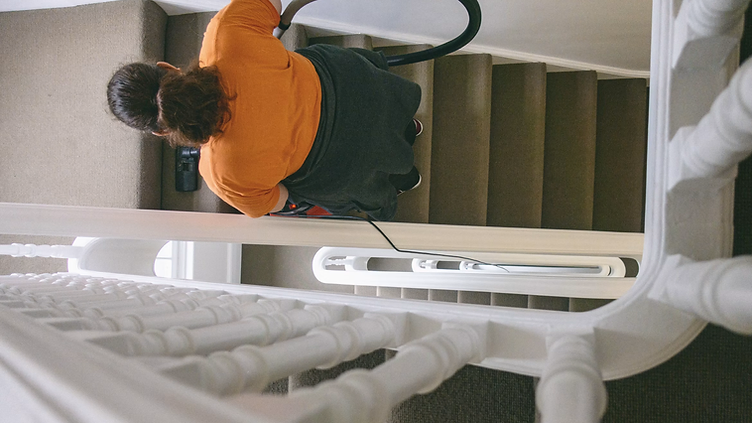 Carpet Cleaning checking new job requests on his phone
