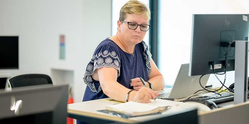 Accountant reviewing tax documents with a small business owner