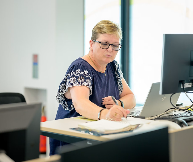 Accountant reviewing tax documents with a small business owner