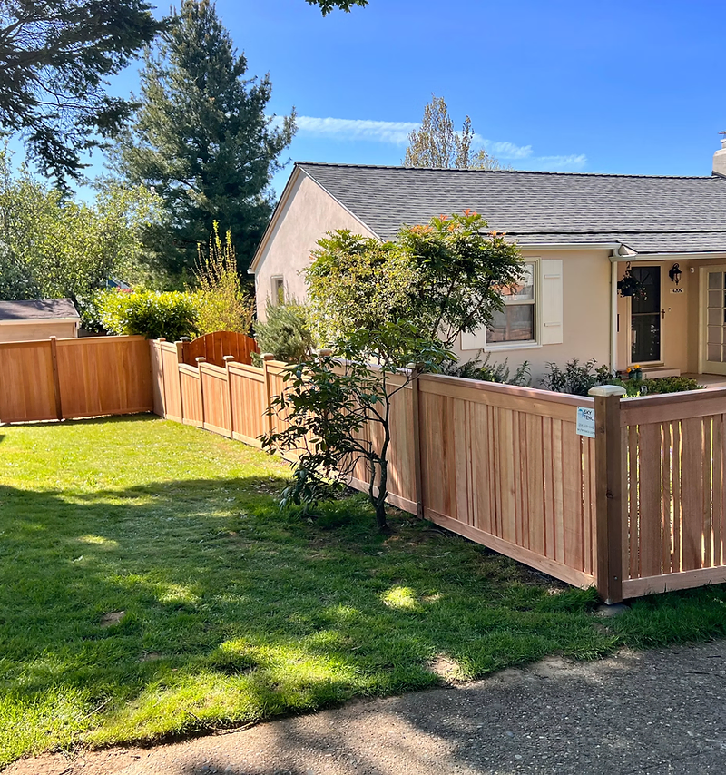 Fence company website design: installer building a wood privacy fence