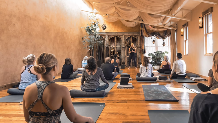 Yoga Studio checking new job requests on his phone