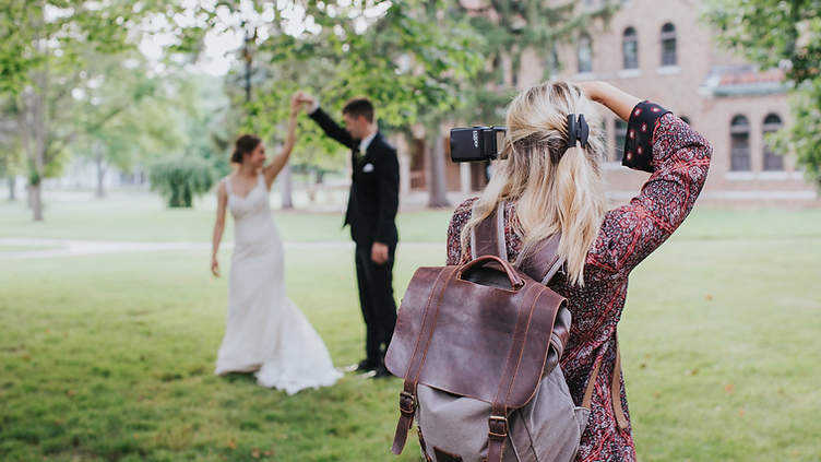 Photographer checking new job requests on his phone