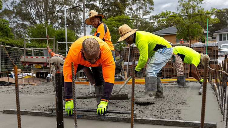 Concrete Contractor checking new job requests on his phone