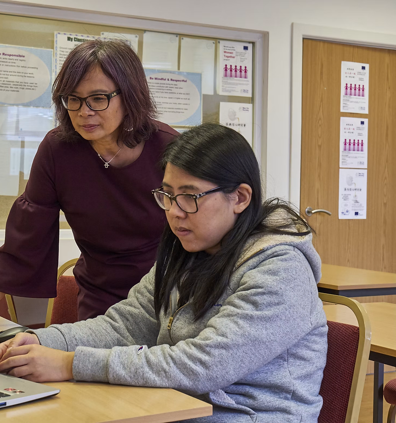 Tutoring website design: tutor helping a student with homework
