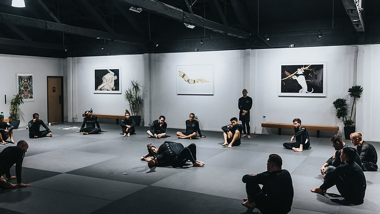 Martial Arts School checking new job requests on his phone