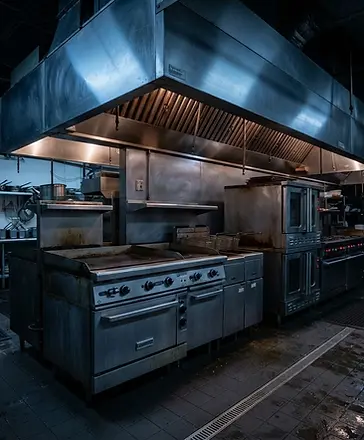Restaurant cooking line with stainless steel equipment in a Chicago commercial kitchen